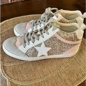 Mi im Sparkly boutique sneakers.